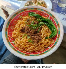 Beef Noodle Soup Served With Chopped Leek And Steamed Mustard Leaf