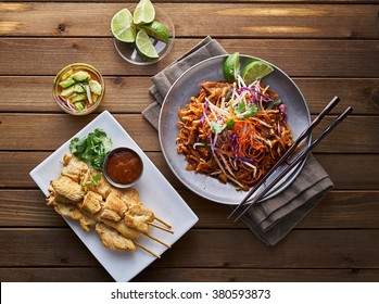 Beef Pad Thai And Chicken Satay Dinner Viewed From Above