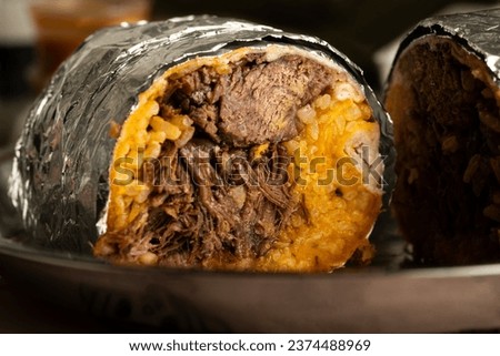 Beef Pares Burrito with Hot Sauce