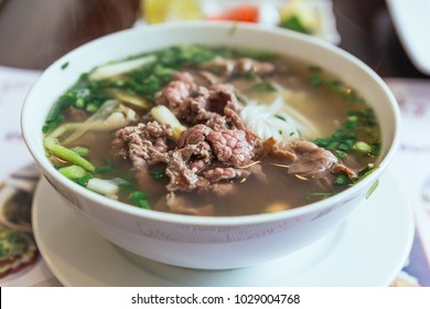 Beef Pho Is A Vietnamese Soup Consisting Of Broth, Rice Noodles Called Banh Pho, A Few Herbs, And Meat, Primarily Made With Either Beef Or Chicken.