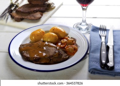 Beef with potatoes and vegetables - Powered by Shutterstock