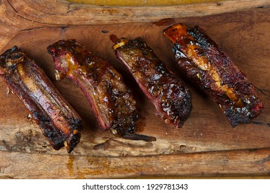 Beef Ribs. Traditional Classic Texas Barbecue Staple. Beef Ribs Seasoned In A Dry Rub And Slow Cooked In A Smoker Over Mesquite Woods Chips. 