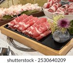 beef roll for hot pot, fresh sliced raw beef, meat roll, wooden plate