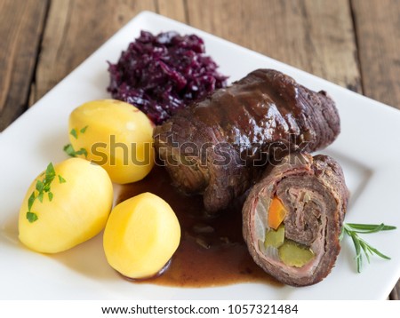 Beef roulade with potatoes and red cabbage