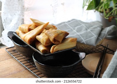 Beef Samosa On Black Plate 