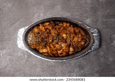 Beef Sizzling served in dish isolated on background top view of bangladesh food