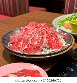 Beef slide on cabbage on dish (plate) in shabu restaurant