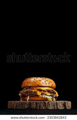 Beef Smash Burger Double Cheese on wooden plate 
