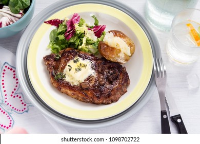 Beef Steak With Baked Potato And Salad