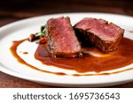 Beef steak filet Mignon in demiglas sauce medium rare