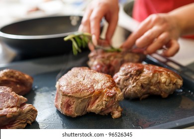 beef steak in a frying pan