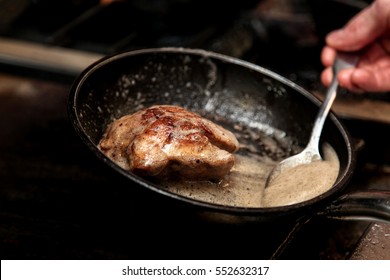 A Beef Steak In A Frying Pan In A French Restaurant