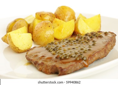 Beef Steak With Green Pepper And Baked Potatoes