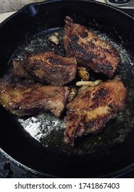 Beef steak grilled on a cast iron pan - Shutterstock ID 1741867403