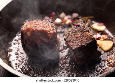 Beef steak on cast iron skillet 