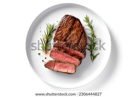 Beef steak served in plate on white background. Grilled steak, medium rare. 