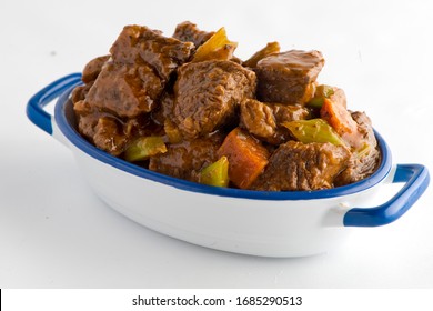 Beef Stew. Chunks Of Beef, Carrots, Celery, Onions, Garlic, Sautéed In Olive Oil And Tomato Paste And Added To Beef Broth And Slow Cooked For Hours. Classic American Diner Favorite.