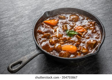 Beef stew iron pan - Shutterstock ID 354755867