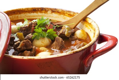 Beef Stew In A Red Crock Pot, Ready To Serve.