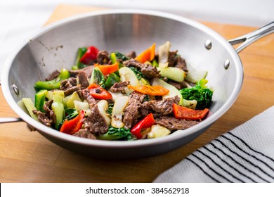 Beef Stir-fry With Healthy Vegetables. Made With Flank Steak, Peppers, Onions And Bok Choy, Stir Fried In An Asian Wok.