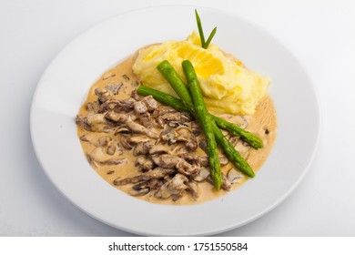 Beef Stroganoff with smashed potatoes