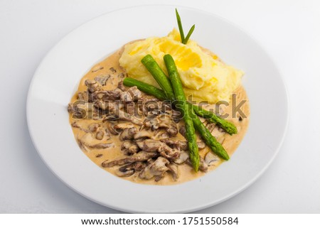 Beef Stroganoff with smashed potatoes