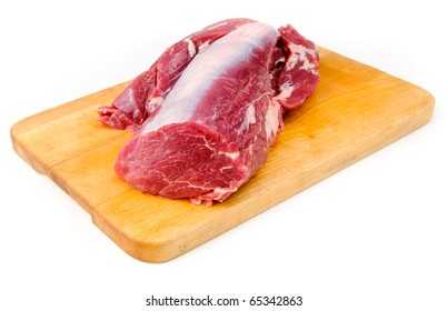 Beef tenderloin on a cutting board