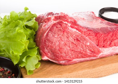 Beef Tenderloin with salt and pepper on white background