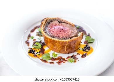 Beef Wellington On White Plate