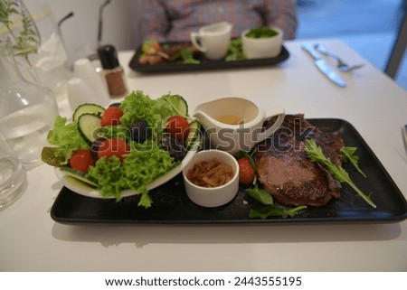 A beefsteak, often called just steak, is a flat cut of beef with parallel faces, usually cut perpendicular to the muscle fibers.