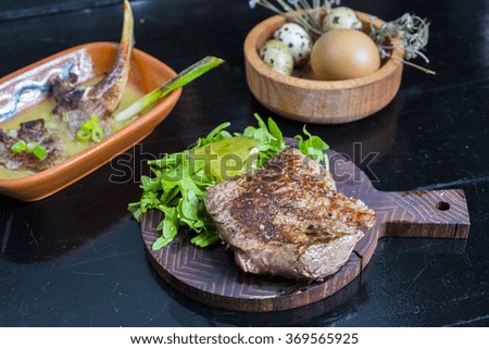 Beefsteak pork ribs and quail eggs