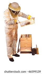 A Beekeeper Holding Up A Frame With Honey And Comb Isolated