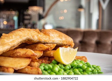 Beer Battered British Fish And Chips With Peas