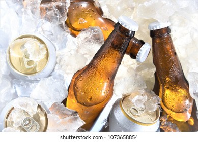 Beer Bottle And Can Chilled In Ice