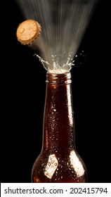 Beer Bottle Popping Its Top.