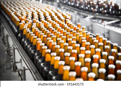 Beer Bottles On The Conveyor Belt