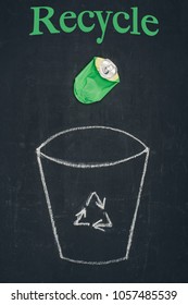 Beer Can Falling Into Drawn Trash Bin With Recycle Sign On Chalkboard