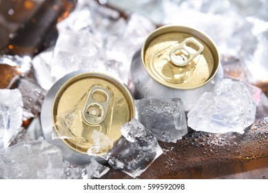 Beer Cans Chill In Ice