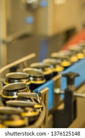 Beer Cans On A Canning Line In A Microbrewery