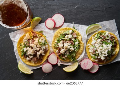 Beer And Carne Asada Mexican Tacos With Queso Fresco Cheese Shot In Top Down Composition