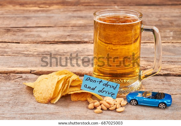 Beer, chips,message, nuts, car. Warning for
drivers. Do not drink and
drive.