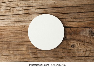 Beer Coaster Mockup On Wooden Background.