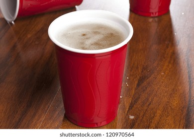 Beer In A Disposable Red Cup At A Party