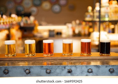 Beer Flight Glasses On The Bar.