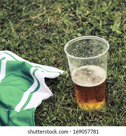 Beer And Football Dress On Grass