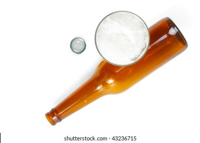 Beer In Glass Empty Bottle And Metal Tap. Top View