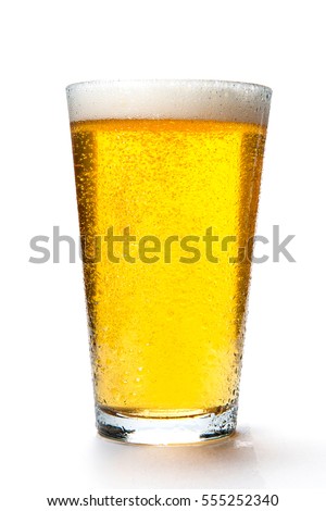 Beer glass with light colored beer and foam on a white background 