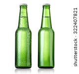 beer in a green bottle isolated on a white background