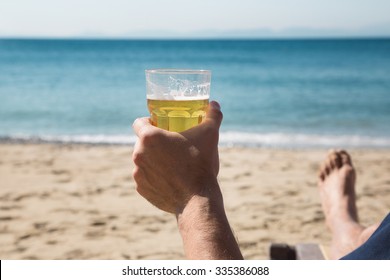 Beer In Hand On The Beach