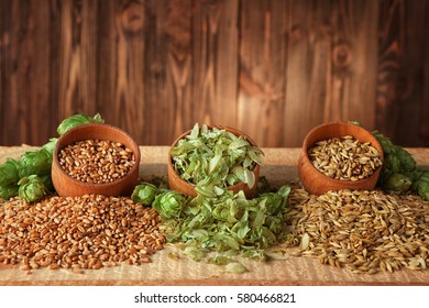 Beer Ingredients On Wooden Background